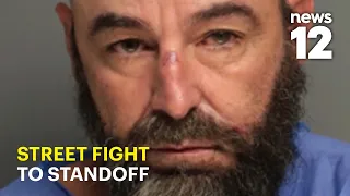 Police exchange gunfire with barricaded suspect after street fight