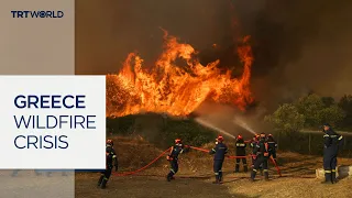 Firefighting helicopters collide near Athens, killing two crew members