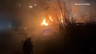 Crews fight flames as power poles catch fire in south Phoenix
