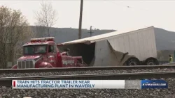 Train hits tractor trailer near manufacturing plant in Waverly