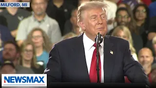 TRUMP responds to 'Communist' heckler in Michigan