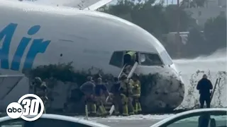 At least 5 dead after Amazon cargo plane barreled off runway at Miami airport