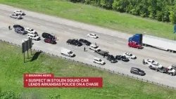 Подозреваемый угнал полицейский автомобиль штата Арканзас, погоня привела к перекрытию трассы I-4... Подозреваемый угнал полицейский автомобиль штата Арканзас, погоня привела к перекрытию трассы I-4...