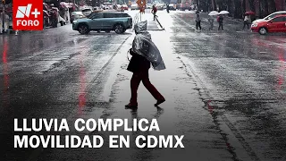 Rain surprises Colonia Roma and impacts traffic in Mexico City