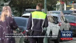 FEMEIE LOVITĂ PE TRECERE