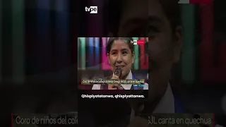 Students sing the National Anthem in Quechua