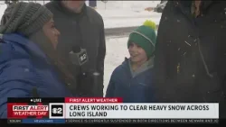 Young man on Long Island wishes "Happy snow day to all"