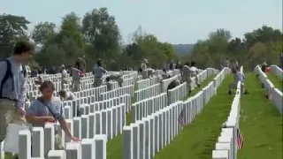 Hundreds of volunteers gather at Fort Logan Cemetery for 9/11 day of service