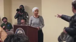 Man sprays liquid at US Rep. Ilhan Omar at Town Hall footage shows