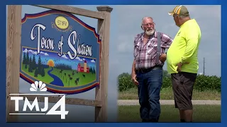 Farmers struggle through dry conditions one year after flash floods in the community