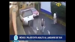 Woman avoids robbery by jumping from taxi