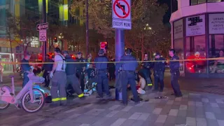 4 shot after trying to intervene in fight between unknown man and woman