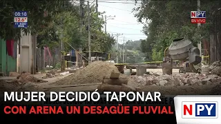 Woman decides to block storm drain with sand