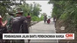 Pembangunan Jalan Bantu Perekonomian Warga
