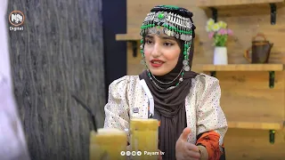 دەستڕەنگینیی خاتوونێک لە دروستکردنی کێک و شیرینییە جیاوازەکان