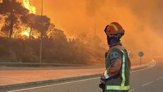 What items should you carry in your backpack for a wildfire evacuation?
