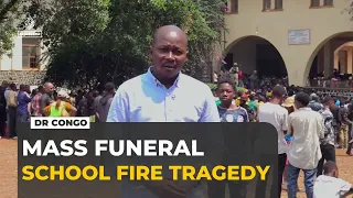 DR Congo holds mass funeral for 29 killed in school fire