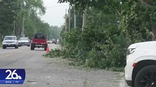 Neenah neighbors come together as they clean up in the aftermath of a devastating storm