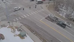 Sinkhole swallows 2 cars in Omaha, Nebraska