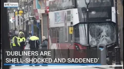 A man has died and three people hospitalised after a Bus Éireann bus mounted a pavement in Dublin