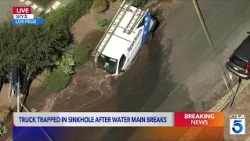 Spectrum truck trapped in sinkhole after water main breaks in Los Feliz