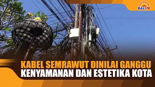 TANGLED CABLES DEEMED A THREAT TO CITY COMFORT AND AESTHETICS