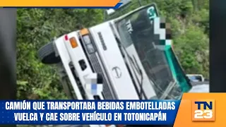 Truck carrying bottled beverages overturns and crushes vehicle in Totonicapán