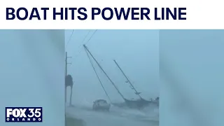 Storm drives sailboat into power lines near Eau Gallie Causeway