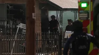 Dallas Police and SWAT respond to a home where man barricaded himself inside and set it on fire