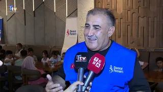 About 50 orphaned children gathered at the same table in Kirkuk