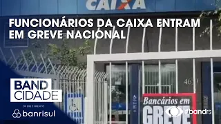 Caixa employees go on national strike over health plan changes