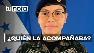 Police search for motorcyclist who was with Naval Force officer before she was shot