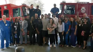 Dallas firefighters celebrate one of their own as his baby son heads home