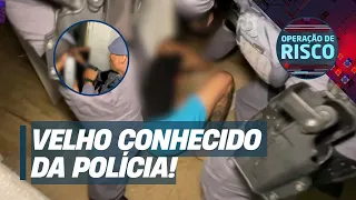"I SURRENDER, OFFICER!": Fugitive surprised by police inside his home