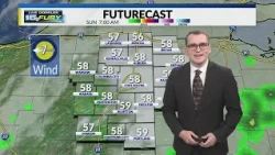 Scattered showers linger Sunday AM