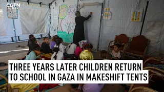 Three years later children return to school in Gaza in makeshift tents