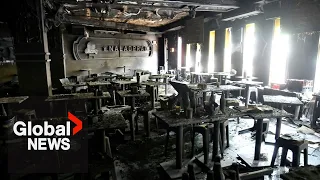 Smoke billows as Bangkok pub fire kills 27; survivors recount deadly blaze