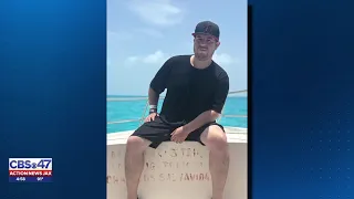 Wife of man hit by semi running from ICE encounter arrives in Florida