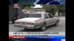 Residents and business owners on Carrera 30 between 35th and 36th streets report deteriorating ro...