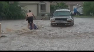 Man rides jet ski through Mesa neighborhood during monsoon storms
