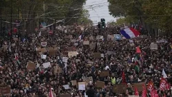 French police clash with protesters following largely peaceful demos