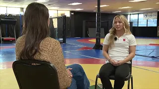 Cheerleader turned state champion wrestler heads to one of top programs