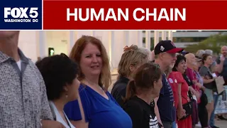 Protesters form human chain outside Kennedy Center to condemn demolition threats