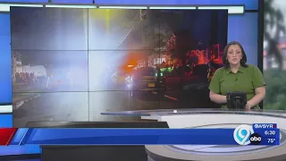 Infant rushed out of burning home on Helen Street by Bystander