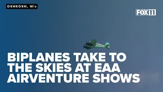 Biplanes perform tricks at EAA AirVenture Thursday air shows