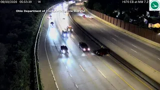 Person leaps onto highway barrier in Ohio seconds before crash
