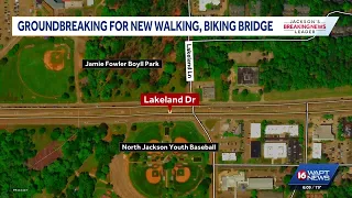 Walking bridge going up across Lakeland Drive