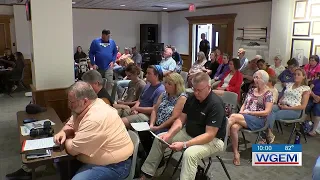 Public commenters share thoughts on Q-RILE, solar properties narrowly approved at Quincy City Cou...