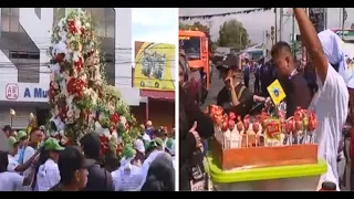 Devotees carry and dance with Santo Domingo in the neighborhoods of Managua