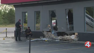 1 hurt, 1 charged after car hits building in Hamburg
